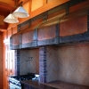 Robust kitchen hood for Bruce Aidells by Archive Designs